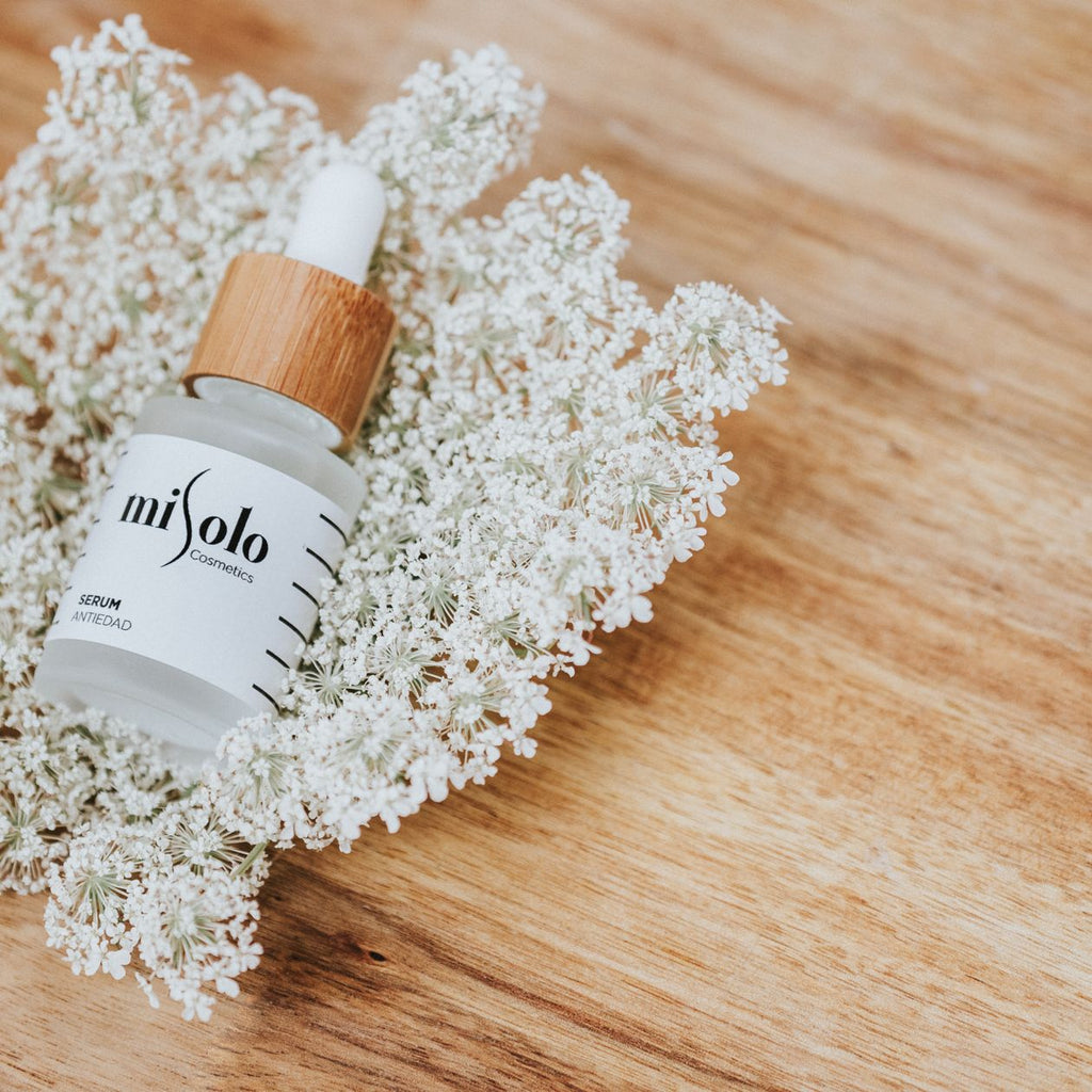 LumaLift Bio-Collagen Glow Mask styled with flowers